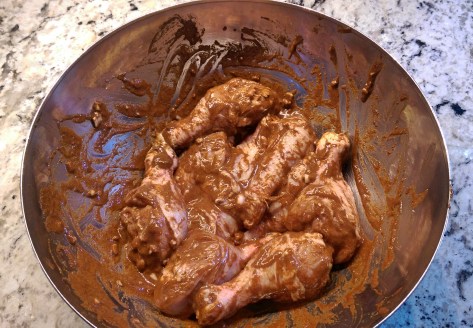 Chicken coated in the spicy rub