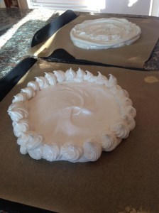Meringues on baking paper ready for the oven