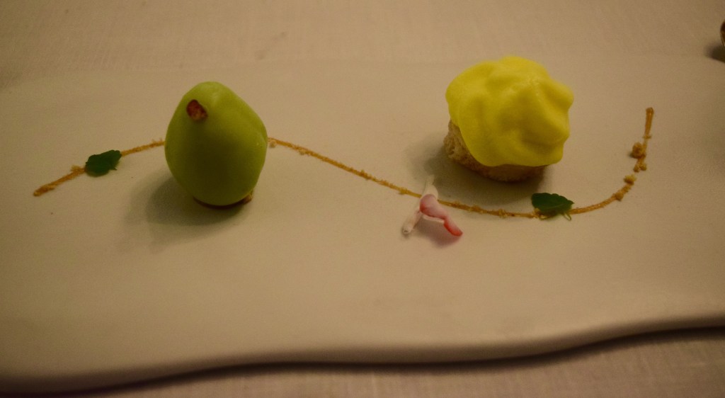 Green white chocolate shaped pear filled with green pineapple and a nutmeg pain perdu topped with pineapple